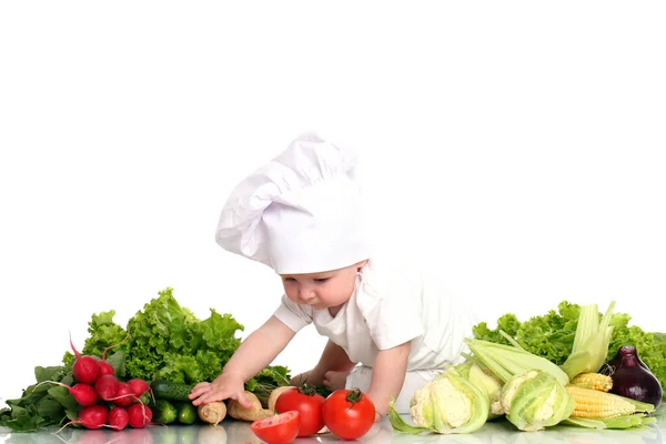 Schattige Baby Chef Kok Met Verschillende Groenten Witte Achtergrond — Stockfoto