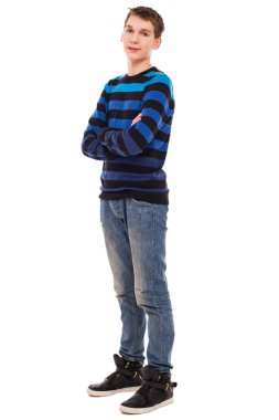 Happy teenager boy in casual standing isolated over white background clipart