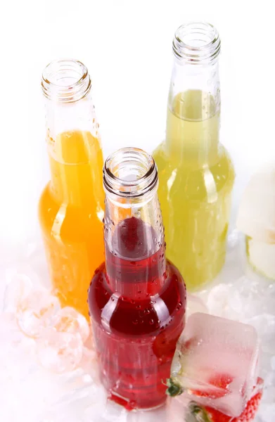 Botellas Con Cóctel Colorido Hielo Sobre Fondo Blanco —  Fotos de Stock