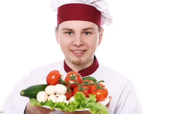 Young Chef Holding Plate Vegetables White Background — Stock Photo, Image