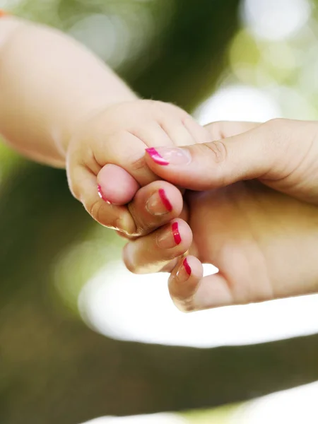 Mother Tenderly Holding His Son Tiny Hand — Stock Photo, Image