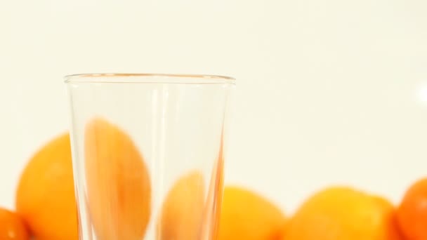 Closeup Fresh Orange Juice Pouring Glass — Stock Video