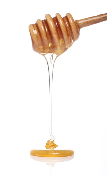 Honey Dripping Wooden Spoon White Background — Stock Photo, Image