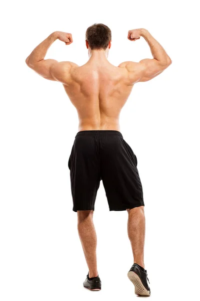 ハンサムな筋肉男とともに裸胴アイソレーター上の白い背景 — ストック写真