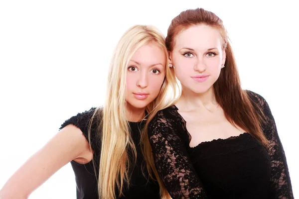 Zwei Schöne Freundinnen Auf Weißem Hintergrund — Stockfoto