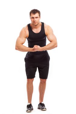 Vücut geliştirici beyaz arkaplan üzerinde izole pozlar