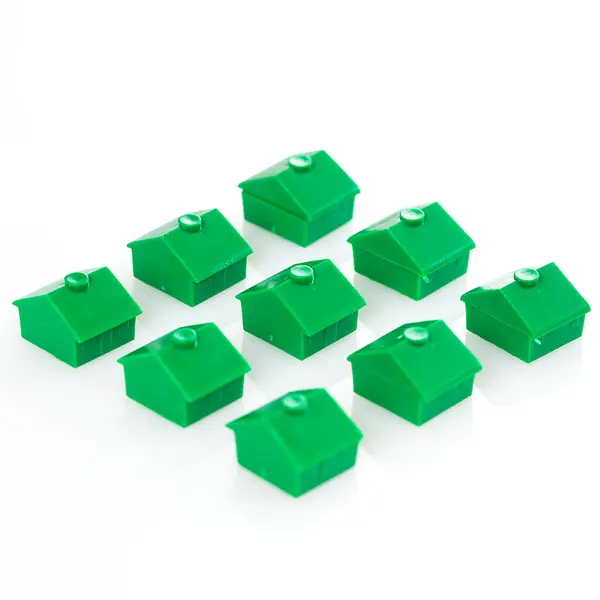 Muchas Casas Juguetes Verdes Sobre Fondo Blanco — Foto de Stock