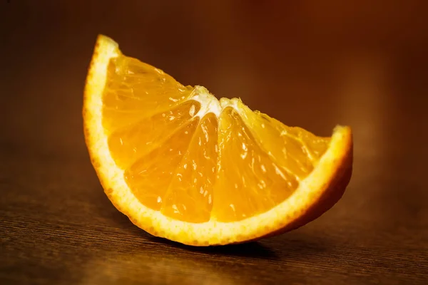 Closeup Slice Orange Wooden Surface — Stock Photo, Image
