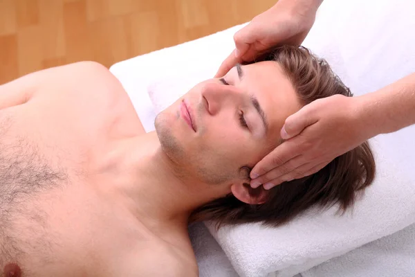Young Handsome Man Enjoying Face Massage — Stock Photo, Image