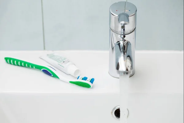 Tap Toothbrush Clean White Sink — Stock Photo, Image