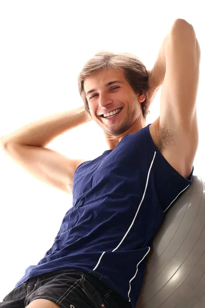 Bonito Desportivo Cara Fazendo Exercício Para Imprensa Sobre Fundo Branco — Fotografia de Stock