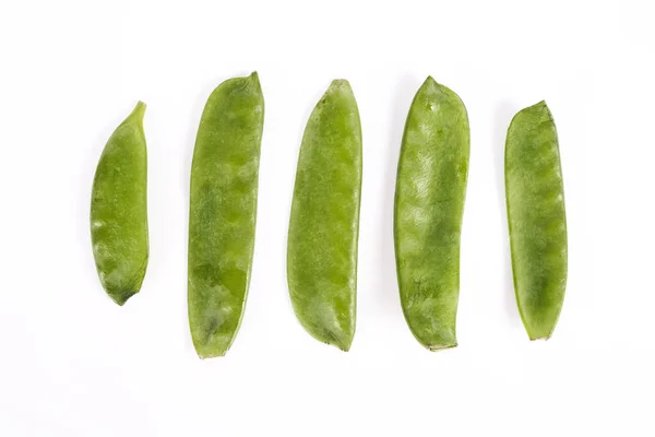 野菜だ 白い背景に緑のエンドウ豆 — ストック写真