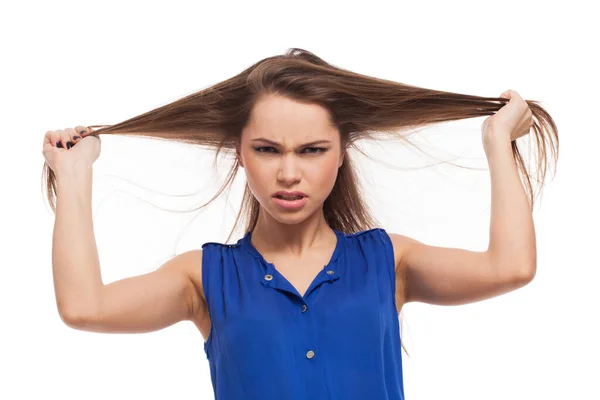 Misunderstanded Girl Holds Her Hair Hands Isolated White Background Stock Image