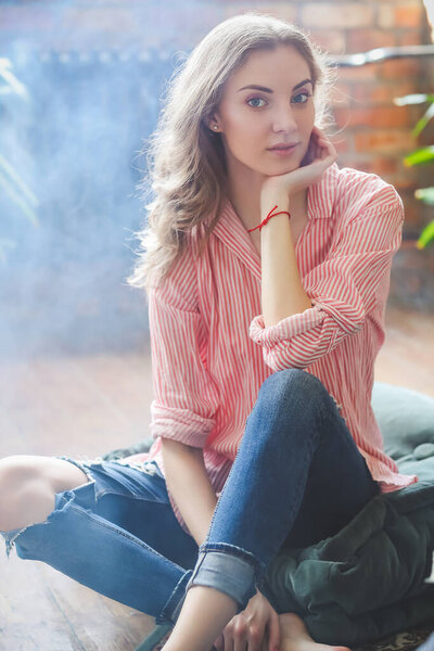 Lifestyle. Woman is relaxing at home