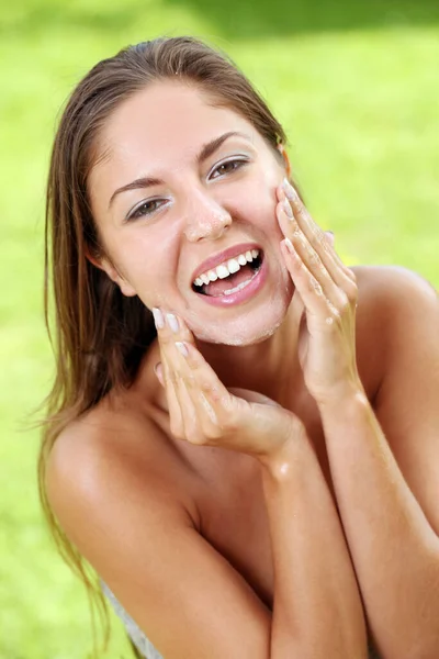 Beautiful Happy Woman Washing Her Face Stock Photo