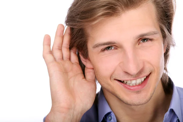 Junger Mann Hört Mit Der Hand Ohr Vor Weißem Hintergrund — Stockfoto