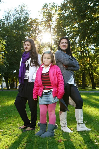 Young Family Taking Healthy Stroll Autumn Park Have Fun — Stock Photo, Image