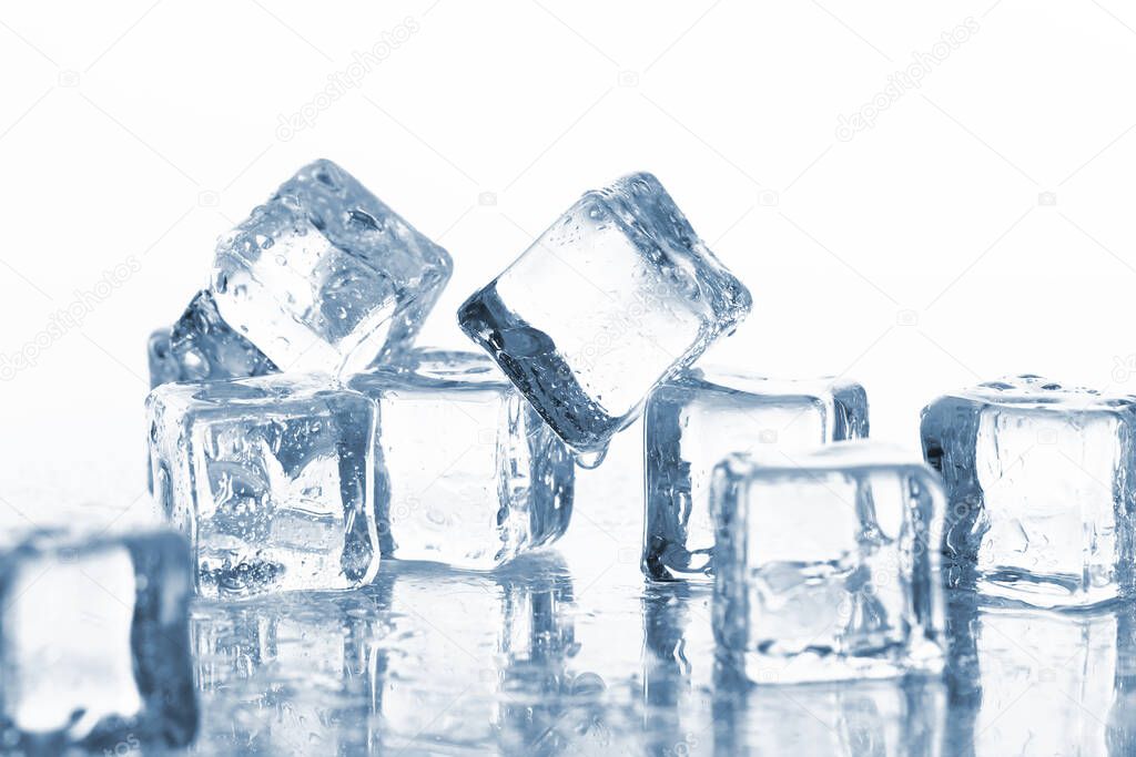 Cold ice cubes with water drops