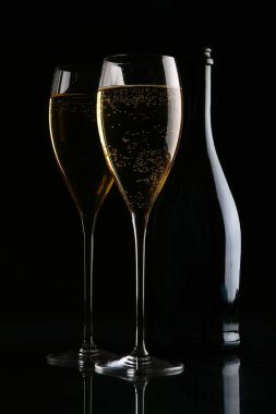 Two elegant glasses with champagne clipart