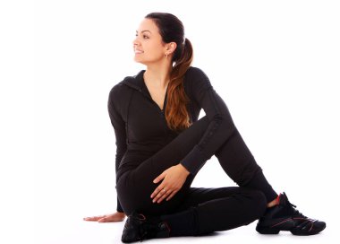 güzel ve mutlu bir kadın beyaz bitti izole fitness egzersizleri yapıyor