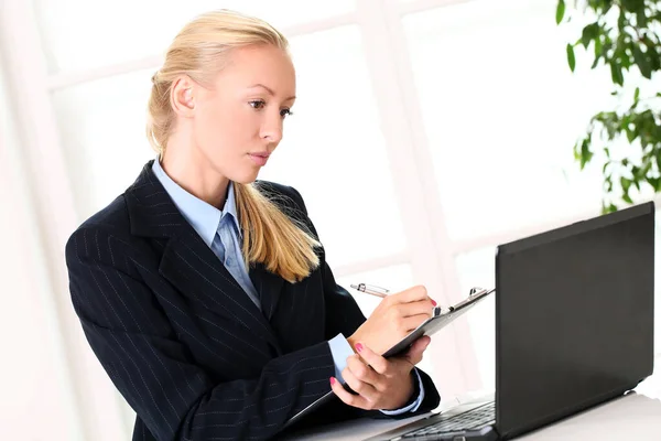 Young Serious Businesswoman Working Office Royalty Free Stock Photos