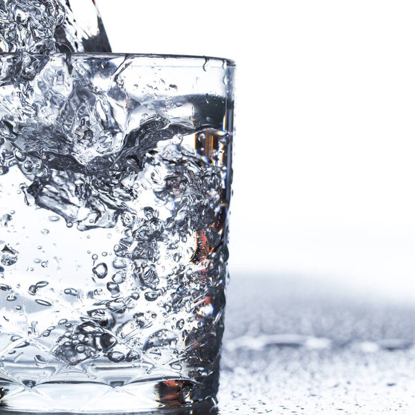 Glass with water on the table