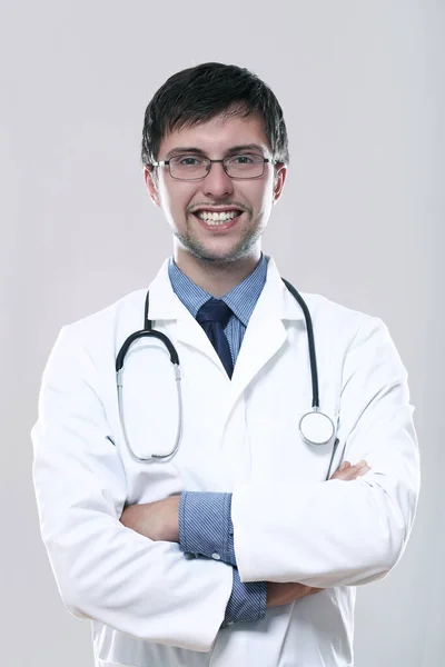 Young Smiling Doctor Stethoscope Gray Background Royalty Free Stock Images