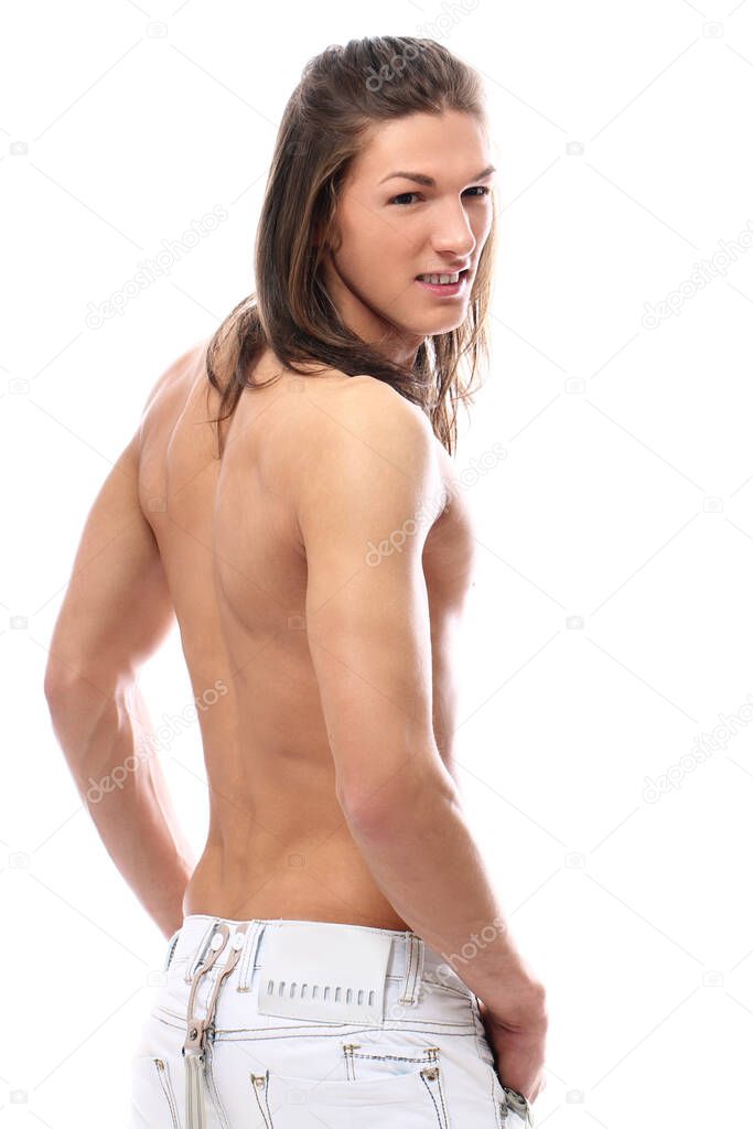 Young and attractive guy with sexy body over white background