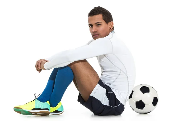 白い背景の上の専門のフットボール選手 — ストック写真