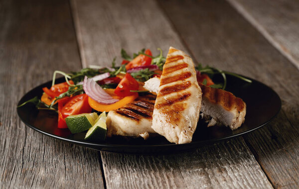 Food. Grilled chicken breast with vegetables