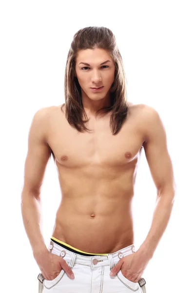 Beyaz arka plan üzerinde seksi vücut ile genç ve çekici adam
