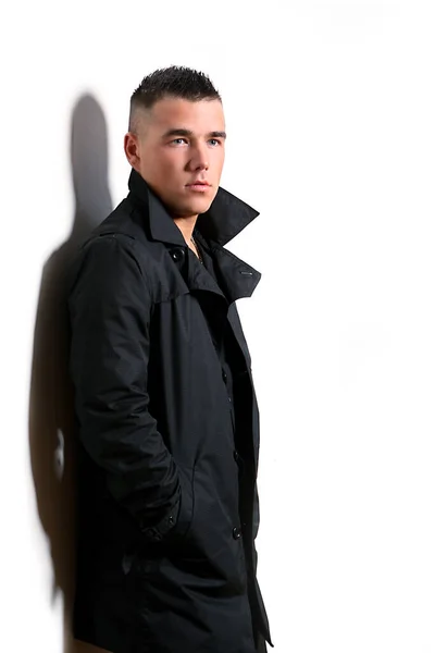 Junger Und Gutaussehender Mann Schwarzem Mantel Über Weißem Hintergrund — Stockfoto
