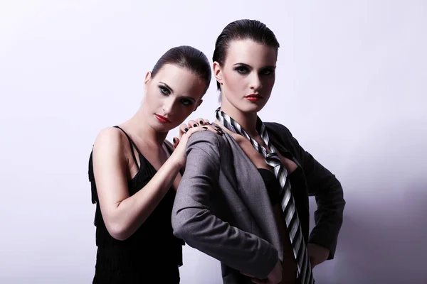 Two Young Sexy Women Posing Studio Stock Photo