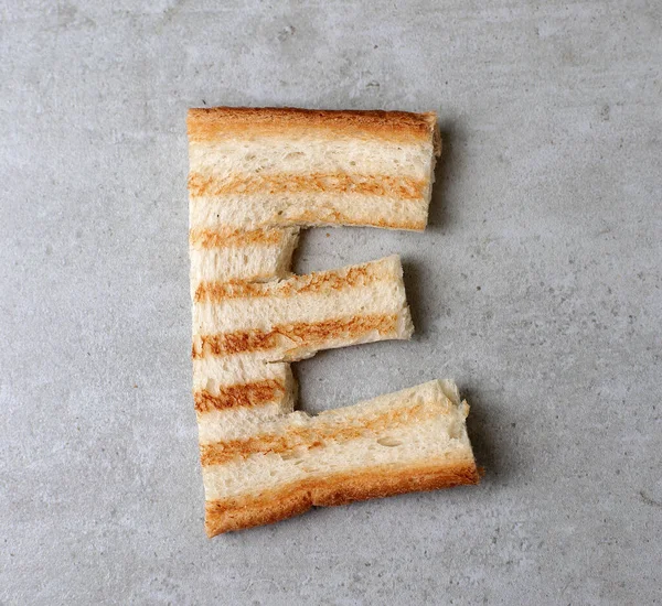 Toasted Bread Letters Table — Stock Photo, Image