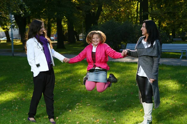 Young Family Taking Healthy Stroll Autumn Park Have Fun — Stock Photo, Image