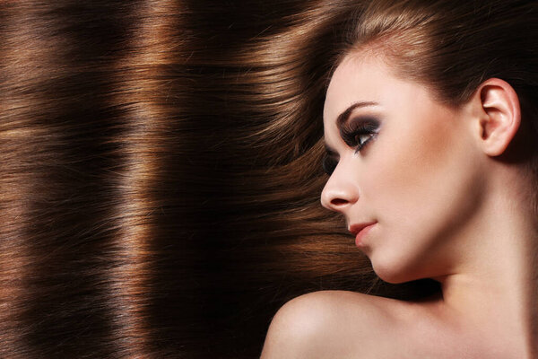 Young woman with beautiful  long hair