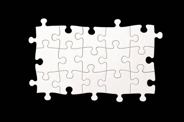 Fehér Puzzle Egy Fekete Háttér — Stock Fotó