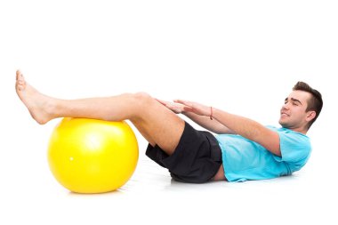 Spor. Topla egzersiz yapan adam.