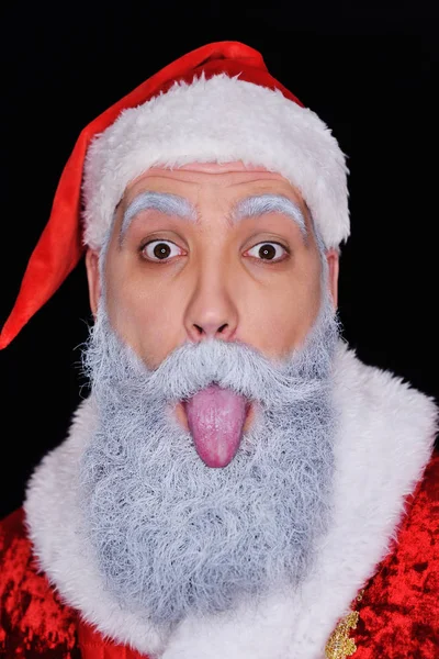 Alegre Papai Noel furando sua língua para fora — Fotografia de Stock
