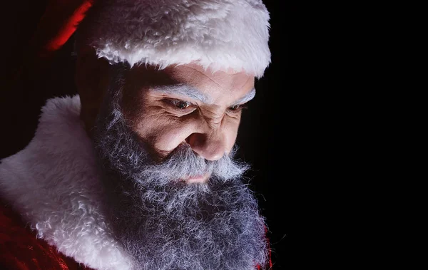 Evil Santa Claus grimaces and scares a terrible face — Stock Photo, Image