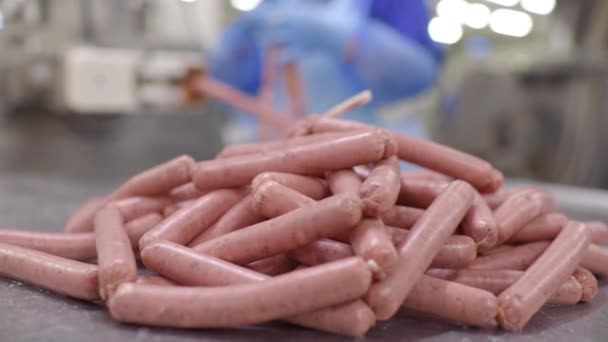 Production of boiled sausages and smoked sausage at a meat factory — Stock Video