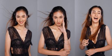 Moda 20 'li yaşlardaki Asyalı kadının portresi çok güzel saçları var, modaya uygun şeyler giyiyor, gri arka planda güçlü pozlar veriyor.