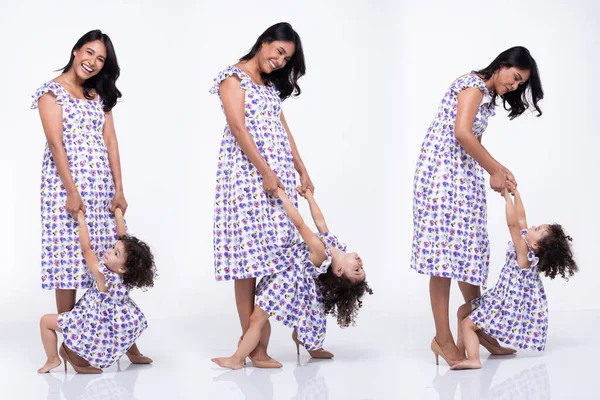 Asian Mother Caucasian Daughter Stand Wear Same Purple Flower Blouse Royalty Free Stock Images