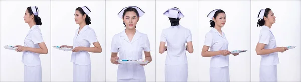 20多岁的亚洲妇女身穿白色护士制服的半身像 女性托盘 转过360度后视镜上方白色背景隔离 — 图库照片