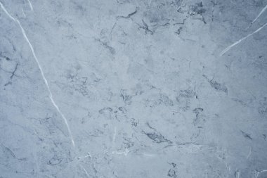 Arka planda mavi çizik taş dokusu var. Doku duvar kâğıdı