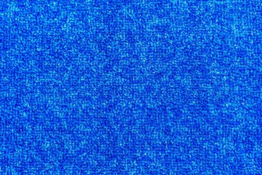 Yoğun dokuma ile mavi bir halı doku.