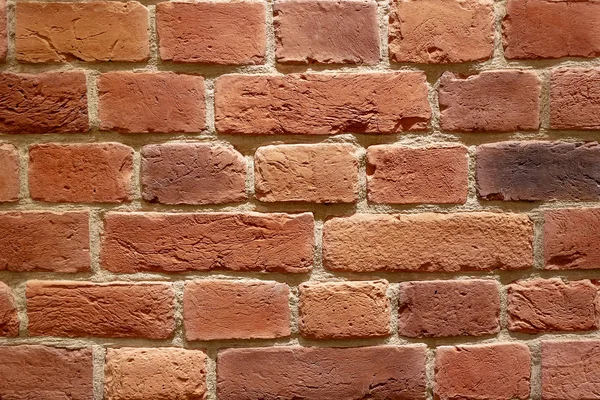 Fondo de ladrillos de construcción marrón. Una pared de ladrillos . — Foto de Stock