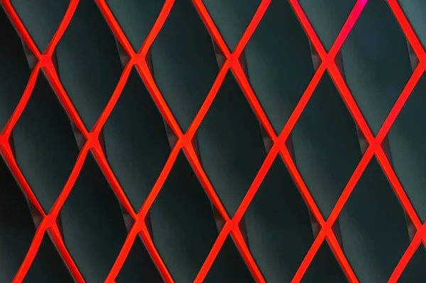 Red diamond-shaped lattice against a dark background.