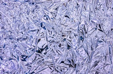 Çok renkli aydınlatmalı alüminyum folyo. Alüminyum folyo arka plan ve doku.