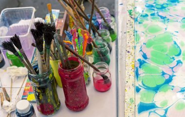 Tools for drawing on water in the technique of ebru. Putting paints on water with the subsequent transfer of the resulting pattern on paper. clipart